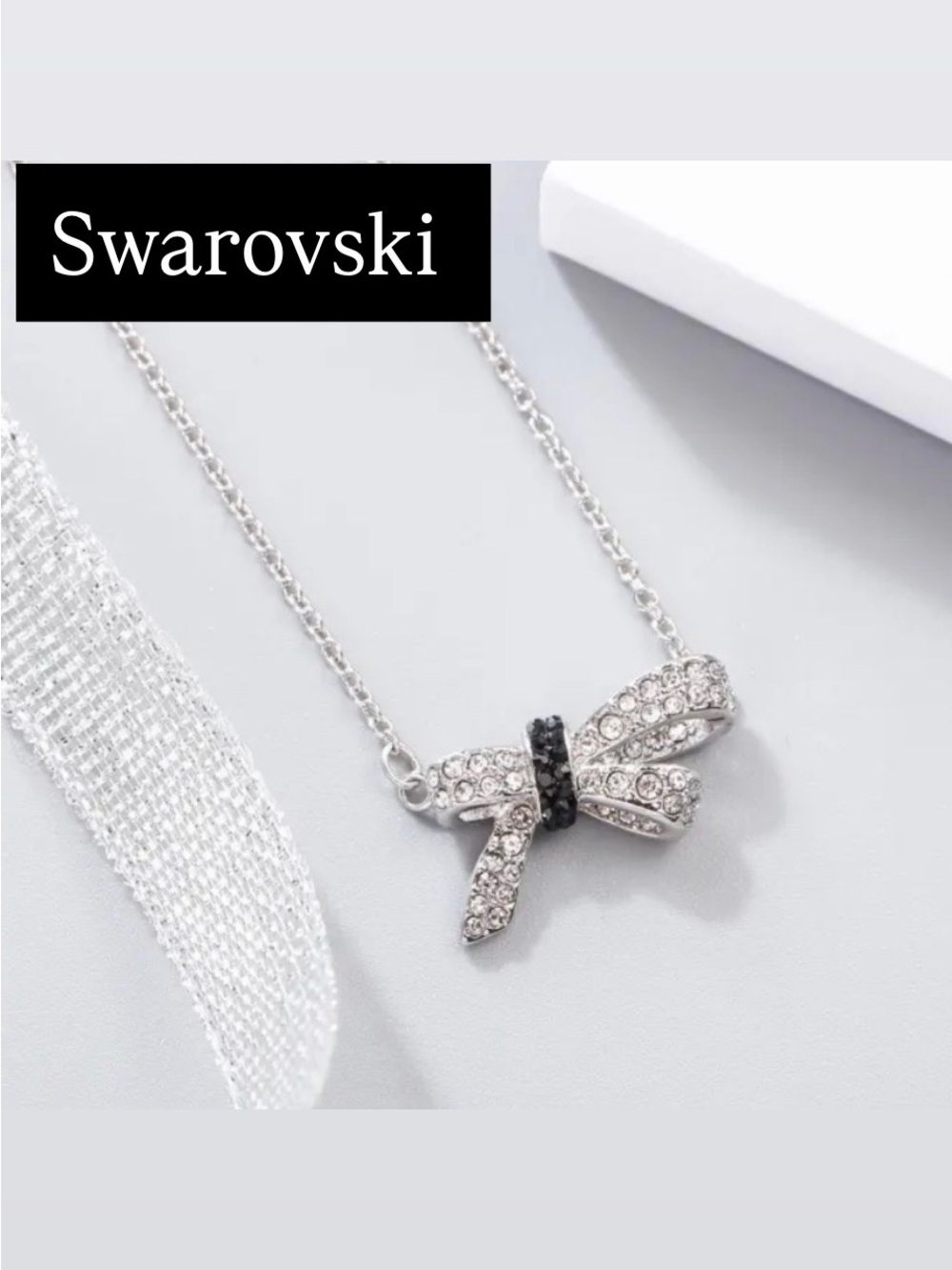 Swarovski Silver Bow Necklace with Clear and Black Crystals
NWT